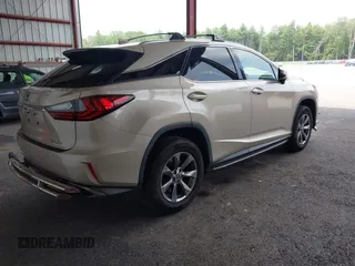 2019 Lexus RX 350 with VIN JTJBZMCA2K2039042, listed as a IAAI auction lot 42469481 with 84,794 mi miles and . Bid and sale history available at DreamBid. Image 4.