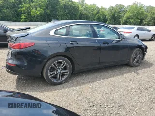 2022 BMW 2 Series 228i with VIN WBA53AK00N7K22579, listed as a Copart auction lot 60313095 with 82,908 mi miles and Salvage title. Bid and sale history available at DreamBid. Image 3.