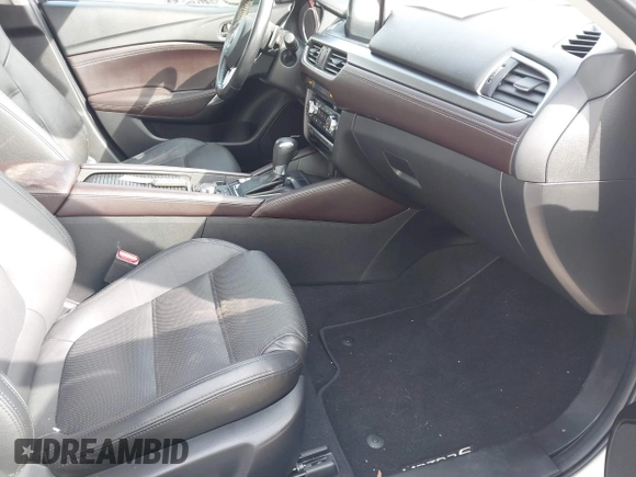 2016 Mazda 6 i Grand Touring с VIN JM1GJ1W55G1468475, выставлен на аукционе IAAI как лот 41651004 с пробегом 31 332 миль миль и . История ставок и продаж доступна на DreamBid. Изображение 5.