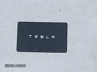 2023 Tesla Model Y Long Range with VIN 7SAYGDEEXPA044335, listed as a IAAI auction lot 42350159 with 26,731 mi miles and . Bid and sale history available at DreamBid. Image 11.
