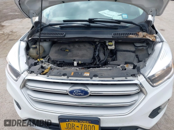 2018 Ford Escape SE z VIN 1FMCU9GDXJUC99453, wystawiony jako IAAI lot #42195202 z przebiegiem 191 840 mil mil oraz . Historia ofert i sprzedaży dostępna na DreamBid. Obrazek 10.