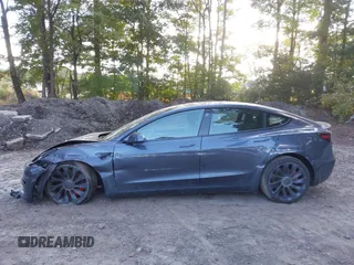 2022 Tesla Model 3 Performance with VIN 5YJ3E1EC7NF329679, listed as a IAAI auction lot 40555901 with 32,552 mi miles and . Bid and sale history available at DreamBid. Image 14.