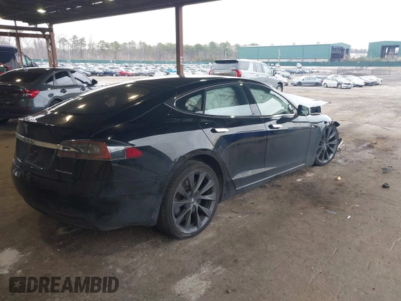 2021 Tesla Model S Long Range Plus with VIN 5YJSA1E28MF425446, listed as a IAAI auction lot 42026147 with 46,464 mi miles and . Bid and sale history available at DreamBid. Image 4.