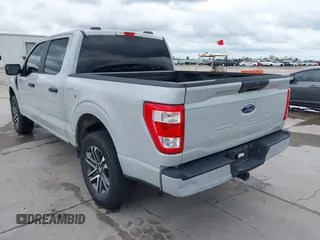 2023 Ford F-150 XL with VIN 1FTEW1EP7PKF17214, listed as a IAAI auction lot 41909017 with 1 mi miles. Bid and sale history available at carsss.com. Image 3.
