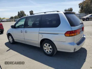 2004 Honda Odyssey EX z VIN 5FNRL18604B000939, wystawiony jako Copart lot #54220845 z przebiegiem 178 615 mil mil oraz Szkoda całkowita • Salvage title. Historia ofert i sprzedaży dostępna na DreamBid. Obrazek 2.