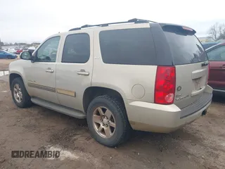 2009 GMC Yukon SLT w/4SA with VIN 1GKEC33379R300278, listed as a IAAI auction lot 41617937 with 240,623 mi miles. Bid and sale history available at carsss.com. Image 3.
