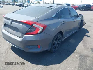 2018 Honda Civic LX with VIN 2HGFC2F57JH546731, listed as a IAAI auction lot 41979976 with 137,531 mi miles. Bid and sale history available at carsss.com. Image 4.
