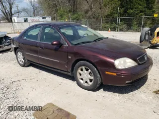 2000 Mercury Sable LS Premium z VIN 1MEFM55S9YA642372, wystawiony jako Copart lot #54555125 z przebiegiem 124 642 mil mil oraz Szkody całkowita. Historia ofert i sprzedaży dostępna na DreamBid. Obrazek 4.