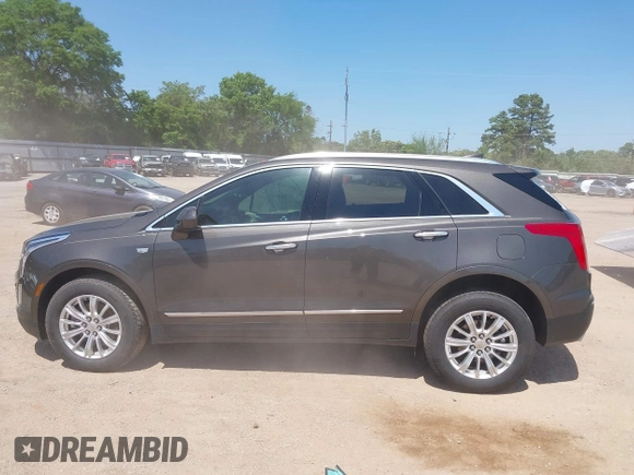 2019 Cadillac XT5 FWD z VIN 1GYKNARS1KZ235083, wystawiony jako IAAI lot #42002995 z przebiegiem 117 430 mil mil oraz . Historia ofert i sprzedaży dostępna na DreamBid. Obrazek 15.