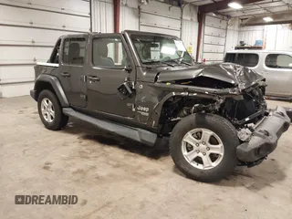 2019 Jeep Wrangler Unlimited Sport S z VIN 1C4HJXDG6KW598997, wystawiony jako IAAI lot #42473098 z przebiegiem 59 232 mil mil oraz . Historia ofert i sprzedaży dostępna na DreamBid. Obrazek 1.