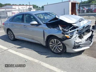 2021 Honda Accord EX-L z VIN 1HGCV3F57MA013218, wystawiony jako IAAI lot #42657411 z przebiegiem 163 965 mil mil oraz . Historia ofert i sprzedaży dostępna na DreamBid. Obrazek 1.