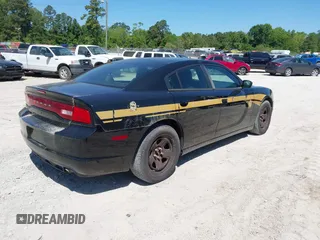 2014 Dodge Charger Police with VIN 2C3CDXAT1EH367015, listed as a IAAI auction lot 42136195 with 121,536 mi miles and . Bid and sale history available at DreamBid. Image 4.