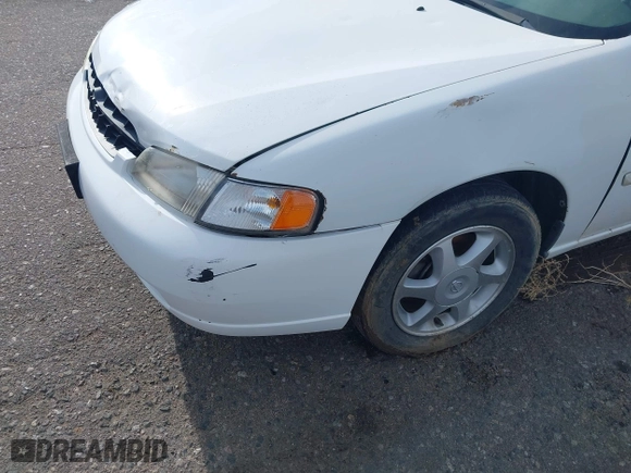 1999 Nissan Altima XE with VIN 1N4DL01D0XC168505, listed as a IAAI auction lot 41928029 with 307,674 mi miles. Bid and sale history available at carsss.com. Image 6.