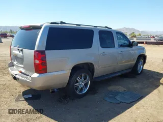 2007 Chevrolet Suburban LT with VIN 1GNFC16J87J230680, listed as a IAAI auction lot 42111804 with 1 mi miles. Bid and sale history available at carsss.com. Image 4.