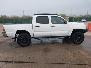 2014 Toyota Tacoma with VIN 3TMLU4EN8EM139665, listed as a IAAI auction lot 41925143 with 190,690 mi miles and . Bid and sale history available at DreamBid. Image 13.