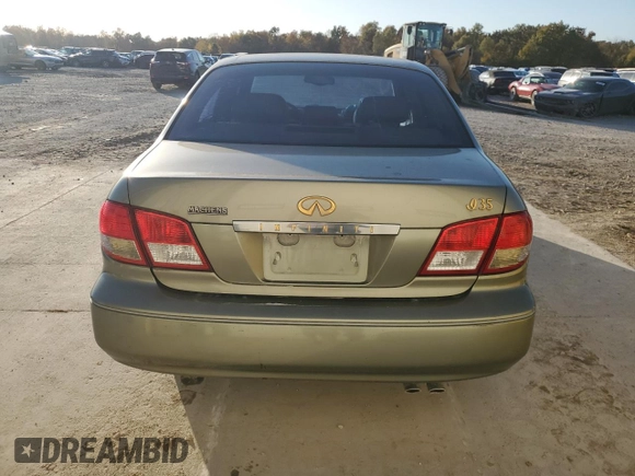 2002 Infiniti I35 Luxury with VIN JNKDA31A62T014458, listed as a Copart auction lot 77677764 with 169,007 mi miles and Salvage Title. Bid and sale history available at DreamBid. Image 6.