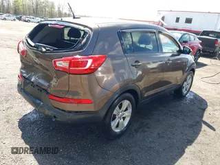 2012 Kia Sportage LX with VIN KNDPBCA27C7293143, listed as a IAAI auction lot 41980919 with 206,457 mi miles and . Bid and sale history available at DreamBid. Image 4.