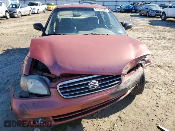 2001 Suzuki Esteem GL z VIN JS2GB41S915202412, wystawiony jako Copart lot #88372235 z przebiegiem 301 061 mil mil oraz Szkoda całkowita • Salvage title. Historia ofert i sprzedaży dostępna na DreamBid. Obrazek 5.