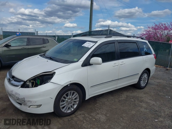 2009 Toyota Sienna XLE with VIN 5TDZK22C79S259793, listed as a IAAI auction lot 41905617 with 185,121 mi miles and . Bid and sale history available at DreamBid. Image 18.