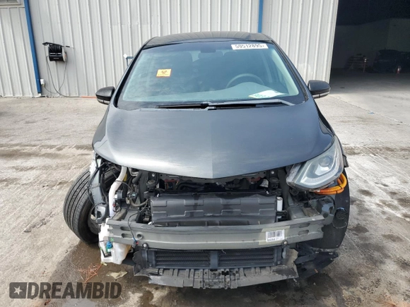 2019 Chevrolet Bolt EV LT with VIN 1G1FY6S04K4120164, listed as a Copart auction lot 59512895 with 57,692 mi miles and Salvage title. Bid and sale history available at DreamBid. Image 5.