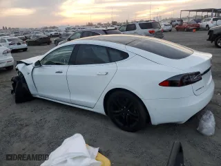 2016 Tesla Model S 70 kWh Battery with VIN 5YJSA1E19GF151945, listed as a Copart auction lot 83851454 with 74,473 mi miles and Non Repairable. Bid and sale history available at carsss.com. Image 2.