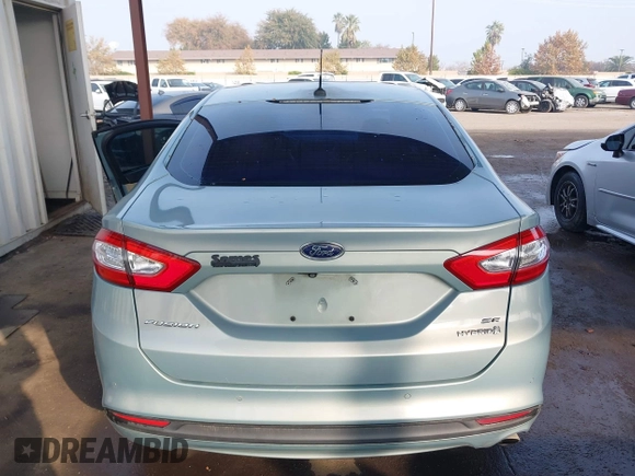 2014 Ford Fusion SE Hybrid with VIN 3FA6P0LU8ER283409, listed as a IAAI auction lot 40984629 with 206,605 mi miles. Bid and sale history available at carsss.com. Image 16.