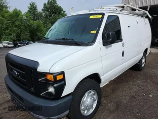 2010 Ford Econoline Cargo Commercial z VIN 1FTNE2EL2ADA74603, wystawiony jako IAAI lot #42511184 z przebiegiem 161 715 mil mil oraz . Historia ofert i sprzedaży dostępna na DreamBid. Obrazek 13.