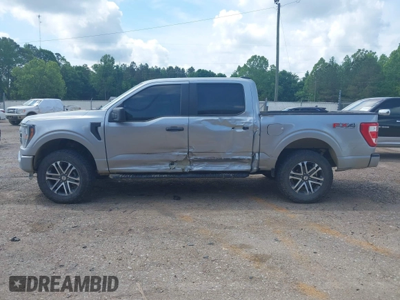 2023 Ford F-150 XL with VIN 1FTFW1E55PKE96110, listed as a IAAI auction lot 42127827 with 35,741 mi miles and . Bid and sale history available at DreamBid. Image 14.