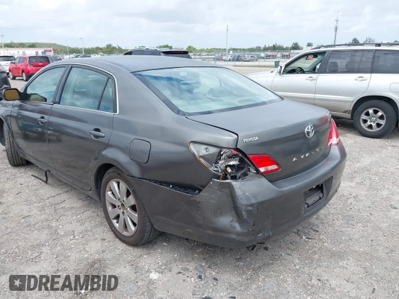 2007 Toyota Avalon XL with VIN 4T1BK36B77U213734, listed as a IAAI auction lot 41956181 with 223,857 mi miles. Bid and sale history available at carsss.com. Image 6.