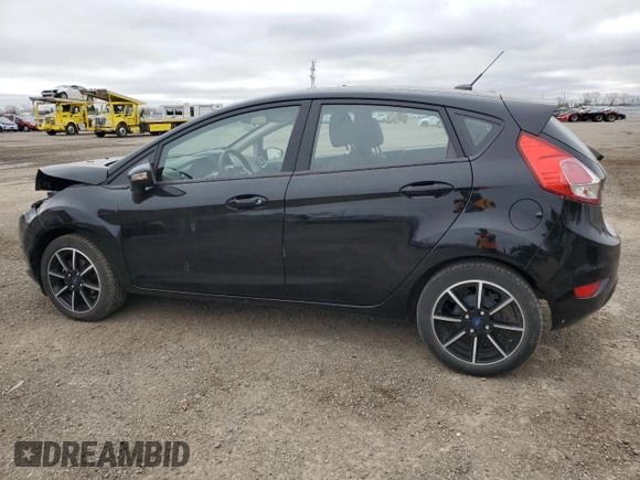 2019 Ford Fiesta SE z VIN 3FADP4EJ8KM124903, wystawiony jako Copart lot #54560125 z przebiegiem 86 616 mil mil oraz Szkoda całkowita • Salvage title. Historia ofert i sprzedaży dostępna na DreamBid. Obrazek 2.