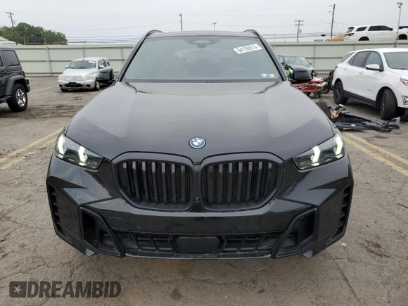 2024 BMW X5 xDrive50e with VIN 5UX43EU02R9U91727, listed as a Copart auction lot 64155574 with 7,050 mi miles and Salvage Title. Bid and sale history available at carsss.com. Image 5.