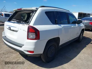2014 Jeep Compass Altitude with VIN 1C4NJCBAXED594798, listed as a IAAI auction lot 41820101 with 234,533 mi miles. Bid and sale history available at carsss.com. Image 4.