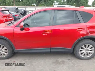 2015 Mazda CX-5 Touring with VIN JM3KE4CYXF0439953, listed as a IAAI auction lot 42124197 with 242,614 mi miles and . Bid and sale history available at DreamBid. Image 14.