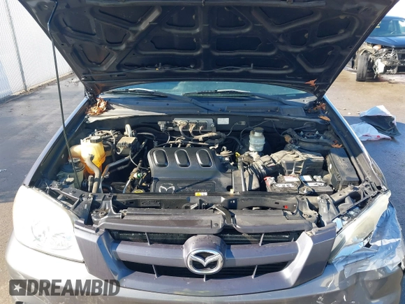 2006 Mazda Tribute LX with VIN 4F2YZ94166KM15756, listed as a IAAI auction lot 41448862 with 101,862 mi miles and . Bid and sale history available at DreamBid. Image 10.
