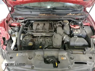 2013 Ford Taurus Limited z VIN 1FAHP2F86DG123974, wystawiony jako Copart lot #54667405 z przebiegiem 121 964 mil mil oraz Szkoda całkowita • Salvage title. Historia ofert i sprzedaży dostępna na DreamBid. Obrazek 11.