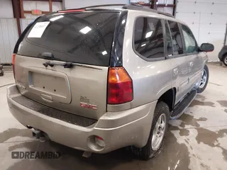 2003 GMC Envoy SLT z VIN 1GKDS13S932299354, wystawiony jako IAAI lot #41238557 z przebiegiem 251 535 mil mil oraz . Historia ofert i sprzedaży dostępna na DreamBid. Obrazek 4.