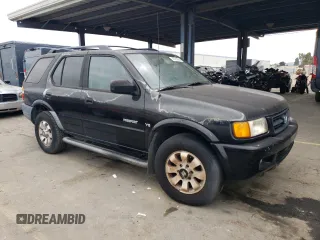 1999 Honda Passport LX with VIN 4S6CK58W4X4412165, listed as a Copart auction lot 43263565 with 0 mi miles and Clean Title. Bid and sale history available at carsss.com. Image 4.