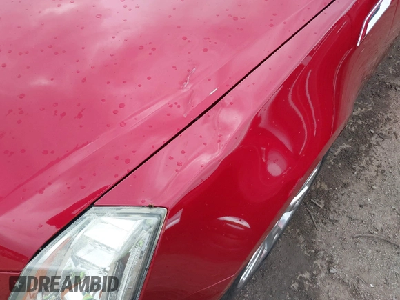 2013 Cadillac CTS Performance with VIN 1G6DK5E3XD0117945, listed as a IAAI auction lot 42341416 with 67,428 mi miles and . Bid and sale history available at DreamBid. Image 6.