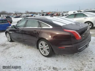 2017 Jaguar XJ with VIN SAJWA2G77H8W10384, listed as a Copart auction lot 45474205 with 63,680 mi miles and Salvage Title. Bid and sale history available at carsss.com. Image 2.