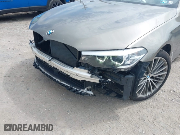 2018 BMW 5 Series 530i xDrive with VIN WBAJA7C55JG909519, listed as a IAAI auction lot 42650263 with 57,077 mi miles and . Bid and sale history available at DreamBid. Image 6.