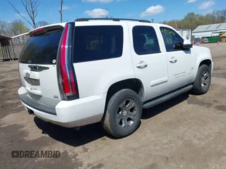 2007 Chevrolet Tahoe LTZ with VIN 1GNFK13007J149042, listed as a IAAI auction lot 41995090 with 216,748 mi miles and . Bid and sale history available at DreamBid. Image 4.