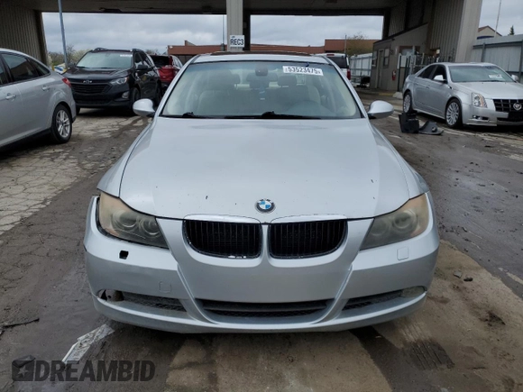 2007 BMW 3 Series 328xi with VIN WBAVC93517KZ71576, listed as a Copart auction lot 53523475 with 185,028 mi miles and Salvage title. Bid and sale history available at DreamBid. Image 5.