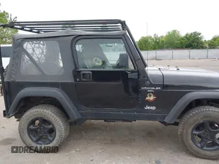 2000 Jeep Wrangler Sahara with VIN 1J4FA59S7YP805628, listed as a IAAI auction lot 42259201 with Not provided miles and . Bid and sale history available at DreamBid. Image 12.