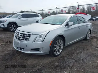 2015 Cadillac XTS Luxury with VIN 2G61N5S37F9192092, listed as a IAAI auction lot 41779854 with 168,592 mi miles and . Bid and sale history available at carsss.com. Image 2.