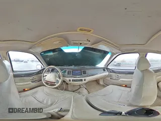 1995 Lincoln Town Car Cartier z VIN 1LNLM83W2SY603452, wystawiony jako Copart lot #55756595 z przebiegiem 243 394 mil mil oraz Szkoda całkowita • Salvage title. Historia ofert i sprzedaży dostępna na DreamBid. Obrazek 14.