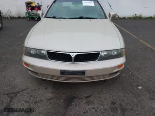 2000 Mitsubishi Diamante LS with VIN 6MMAP67P7YT005234, listed as a IAAI auction lot 41896098 with 131,852 mi miles. Bid and sale history available at carsss.com. Image 6.