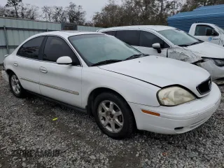 2000 Mercury Sable with VIN 1MEFM53U3YA617844, listed as a Copart auction lot 86656124 with 160,318 mi miles and Salvage title. Bid and sale history available at DreamBid. Image 4.