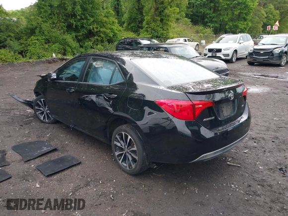 2017 Toyota Corolla L z VIN 2T1BURHE7HC818988, wystawiony jako IAAI lot #42287441 z przebiegiem 197 475 mil mil oraz . Historia ofert i sprzedaży dostępna na DreamBid. Obrazek 3.