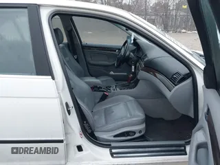 2000 BMW 3 Series 328i with VIN WBAAM5341YFR20178, listed as a IAAI auction lot 41477979 with 151,328 mi miles. Bid and sale history available at carsss.com. Image 5.