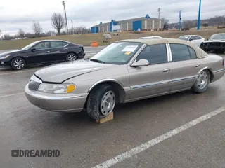 2001 Lincoln Continental with VIN 1LNHM97VX1Y627039, listed as a IAAI auction lot 41482016 with 143,317 mi miles and . Bid and sale history available at DreamBid. Image 17.
